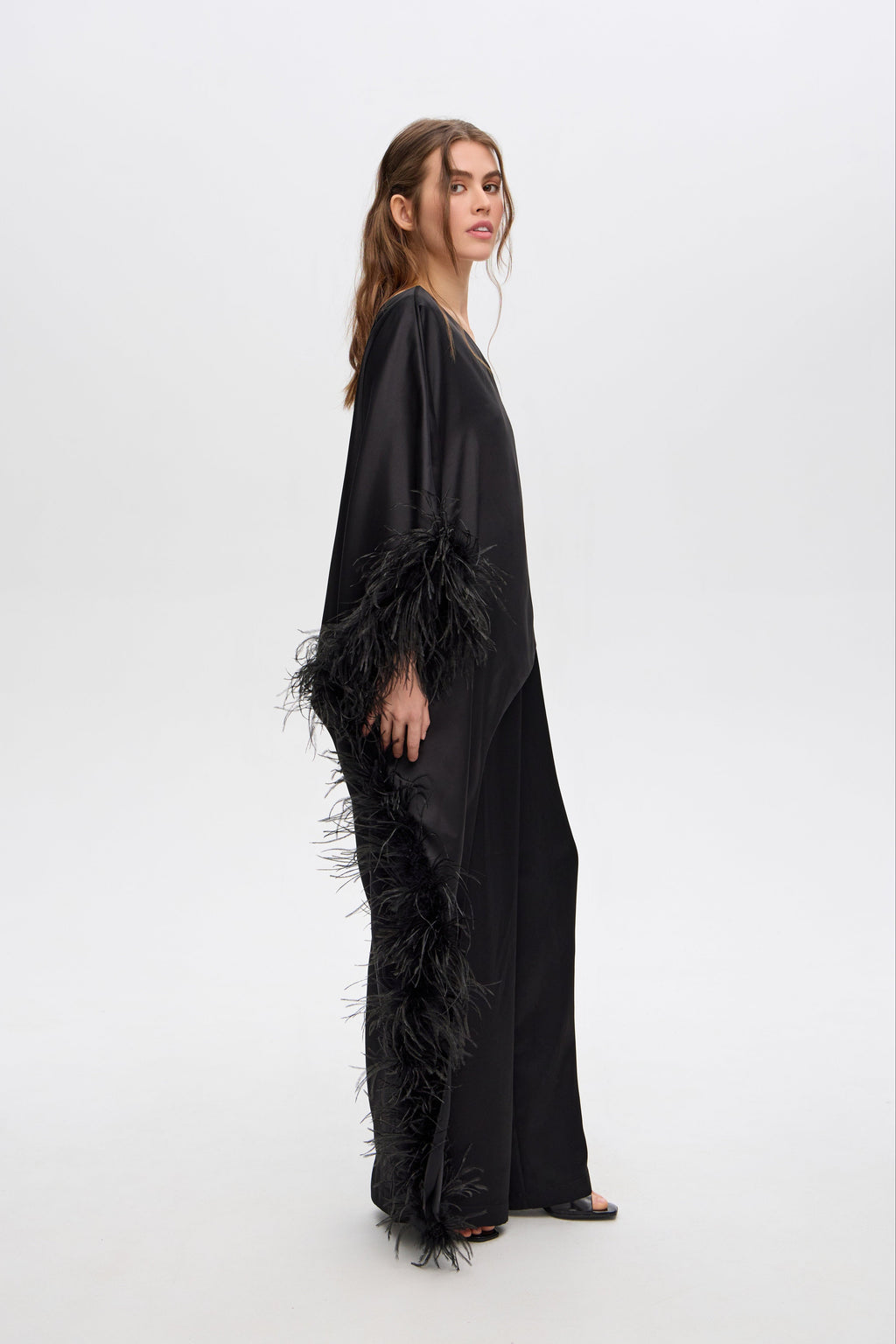 Asymmetrical top with feathers